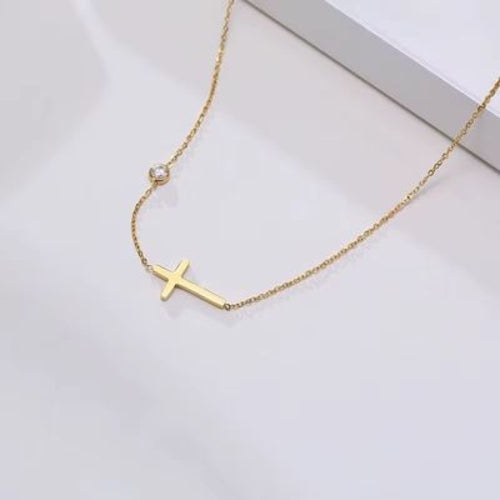 Pulsera/tobillera con cruz de inspiración religiosa