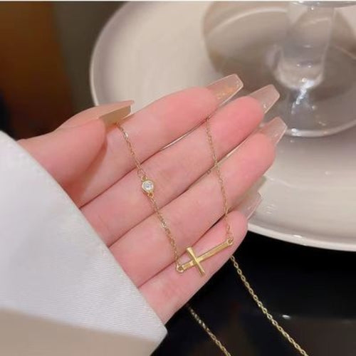 Pulsera/tobillera con cruz de inspiración religiosa